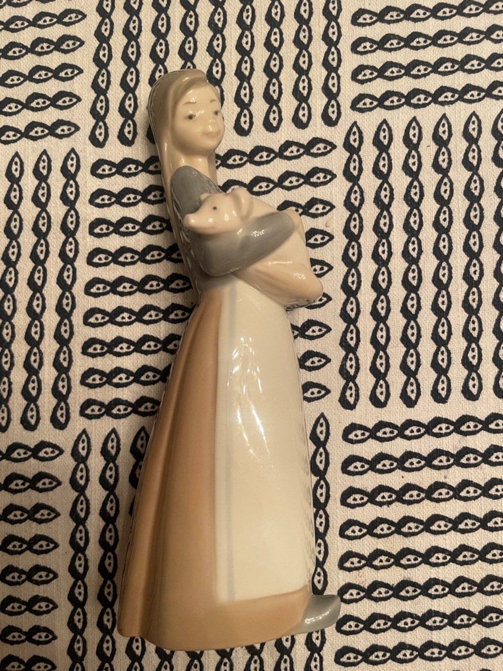 Lladró "Girl with Pig" porcelain figurine.
